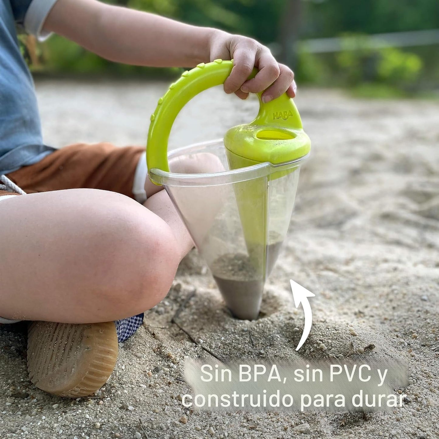 Reloj de arena de playa con colador